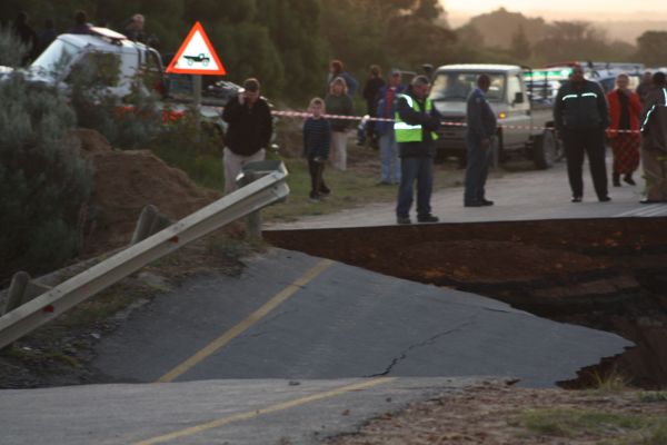 A gaping hole at the top end of the Sand River bridge