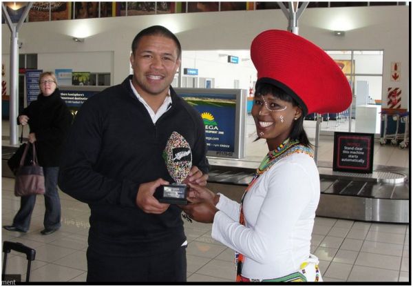 all balcks capt receives trophy