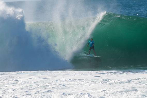 Dale Staples (St Francis Bay) stands tall inside a gaping Pipeline barrel in Hawaii on his way to 9th place in the Volcom Pipe Pro on Saturday Photo: Bernie Baker