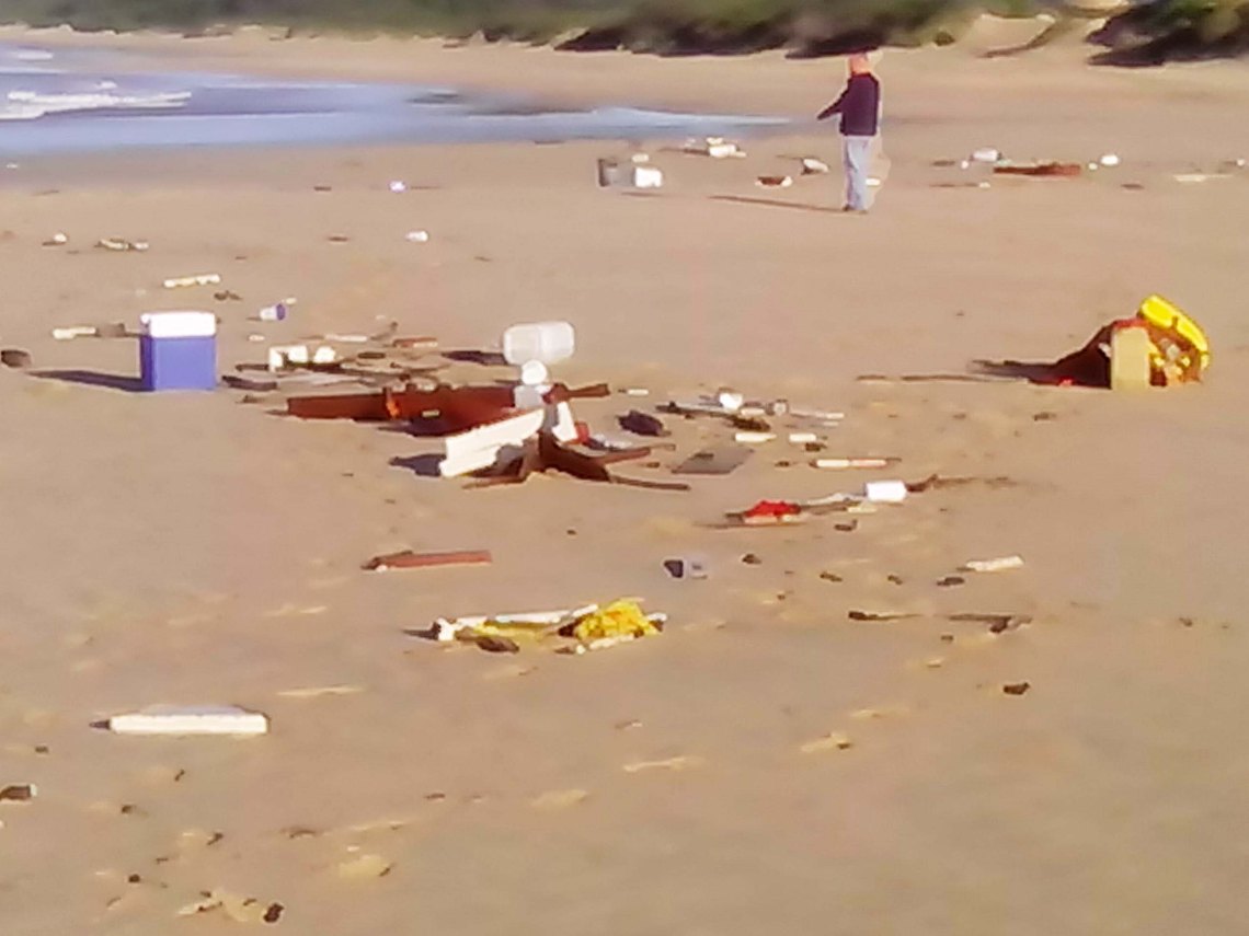 Debris from Darren Hansen's yacht, Ingrid on the beach at Oyster Bay.